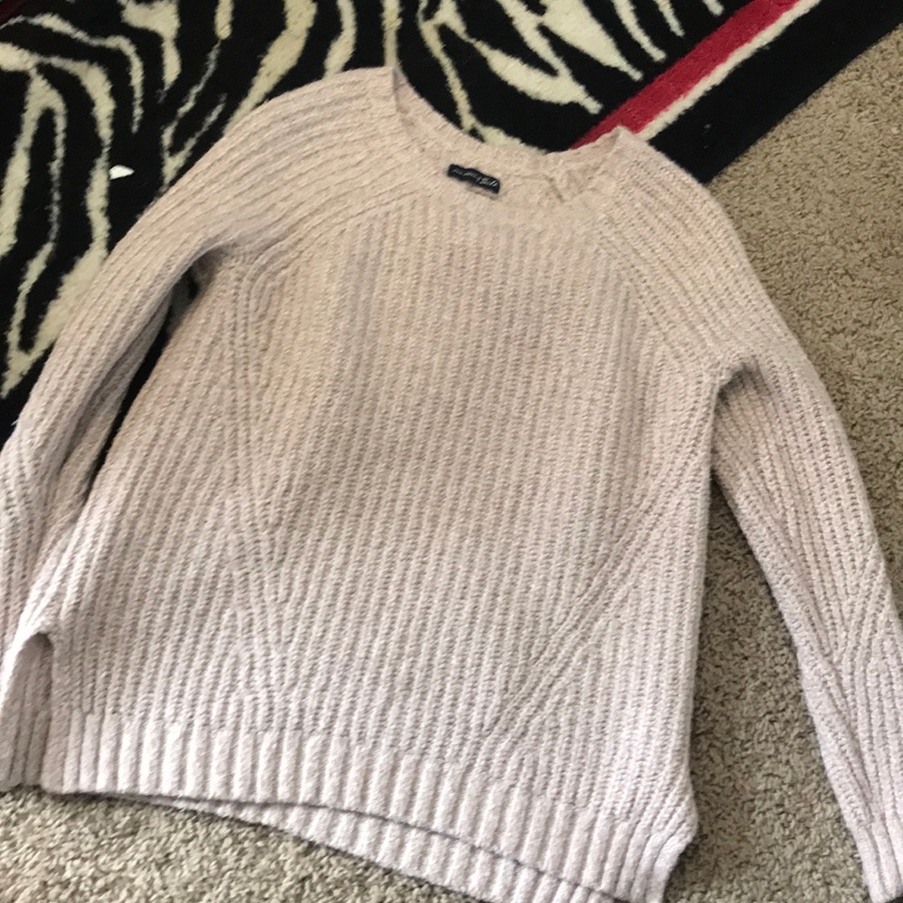 lite pink sweater.